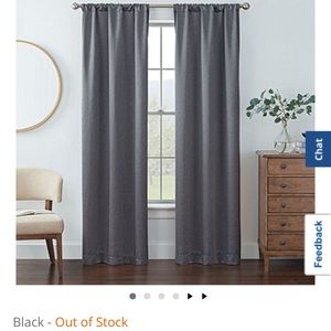 A pair of excellent condition grey black out curtains!